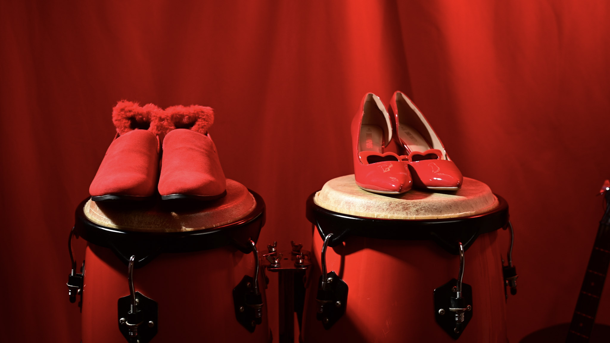 Signature red shoes of the Redd Shoee Creww