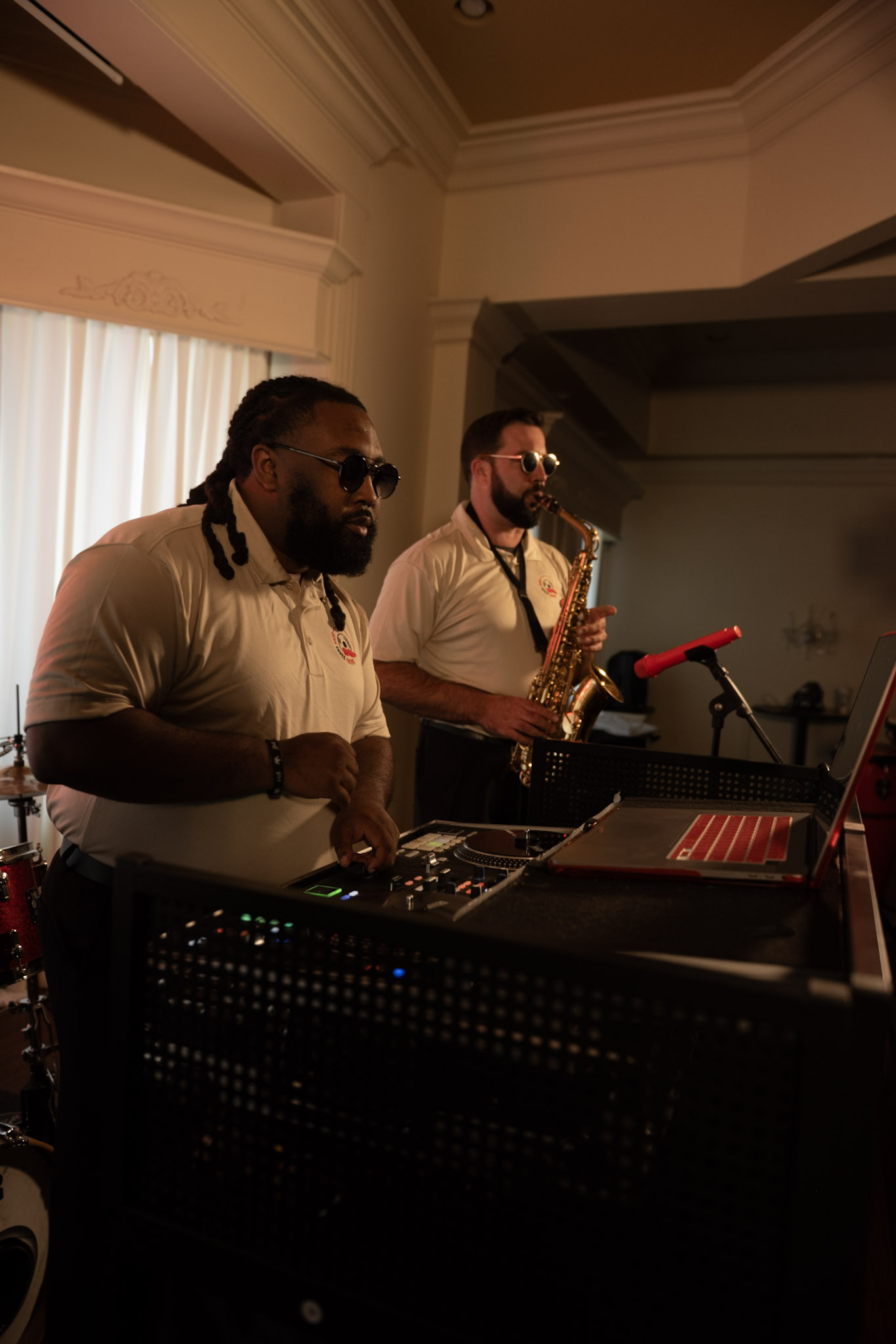 Redd Shoee Creww DJ and saxophonist